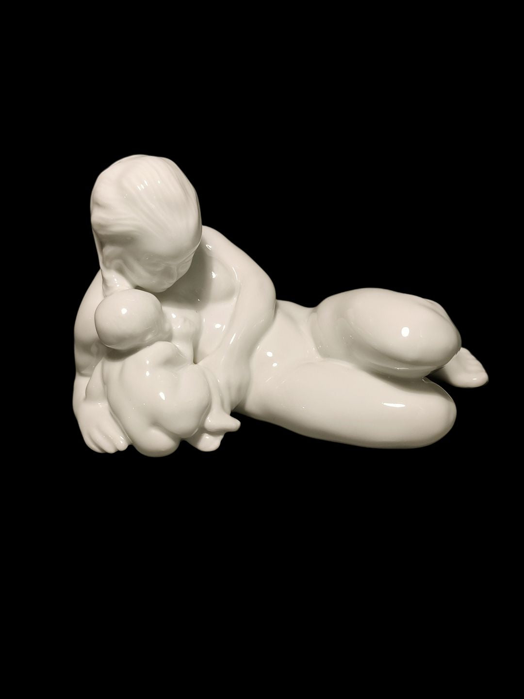 Bing & Grøndahl Blanc de Chine Figurine of Woman with Child No 4029. Designed by Kai Nielsen. Measures 11 cm x 18 cm