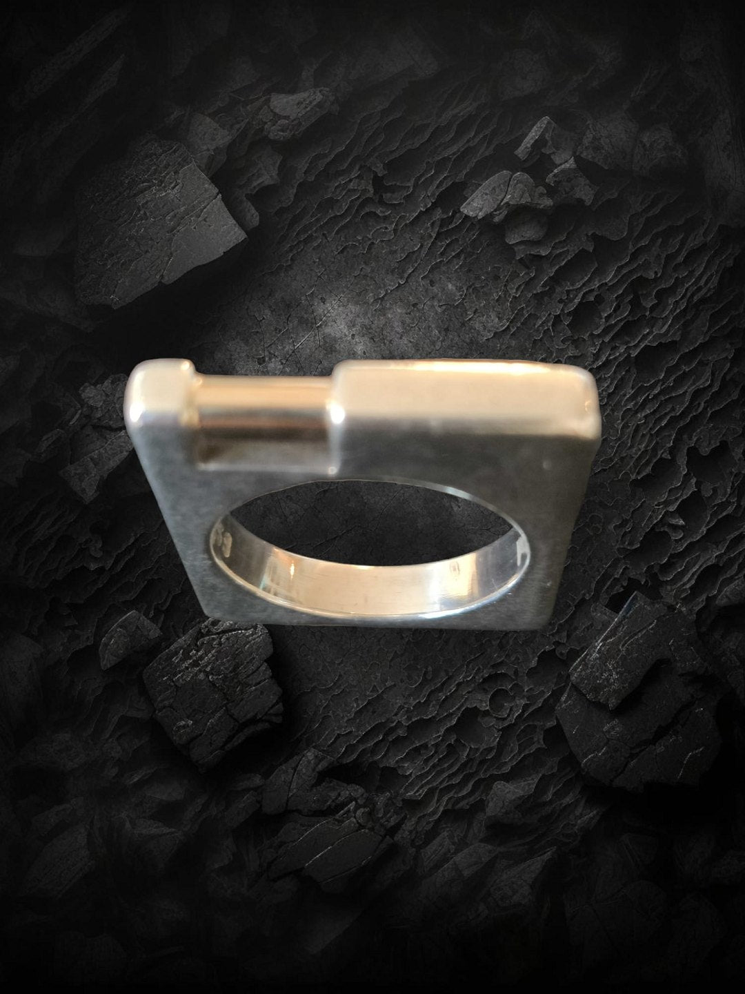 Flemming Knudsen unique sterling silver ring with gold piping.