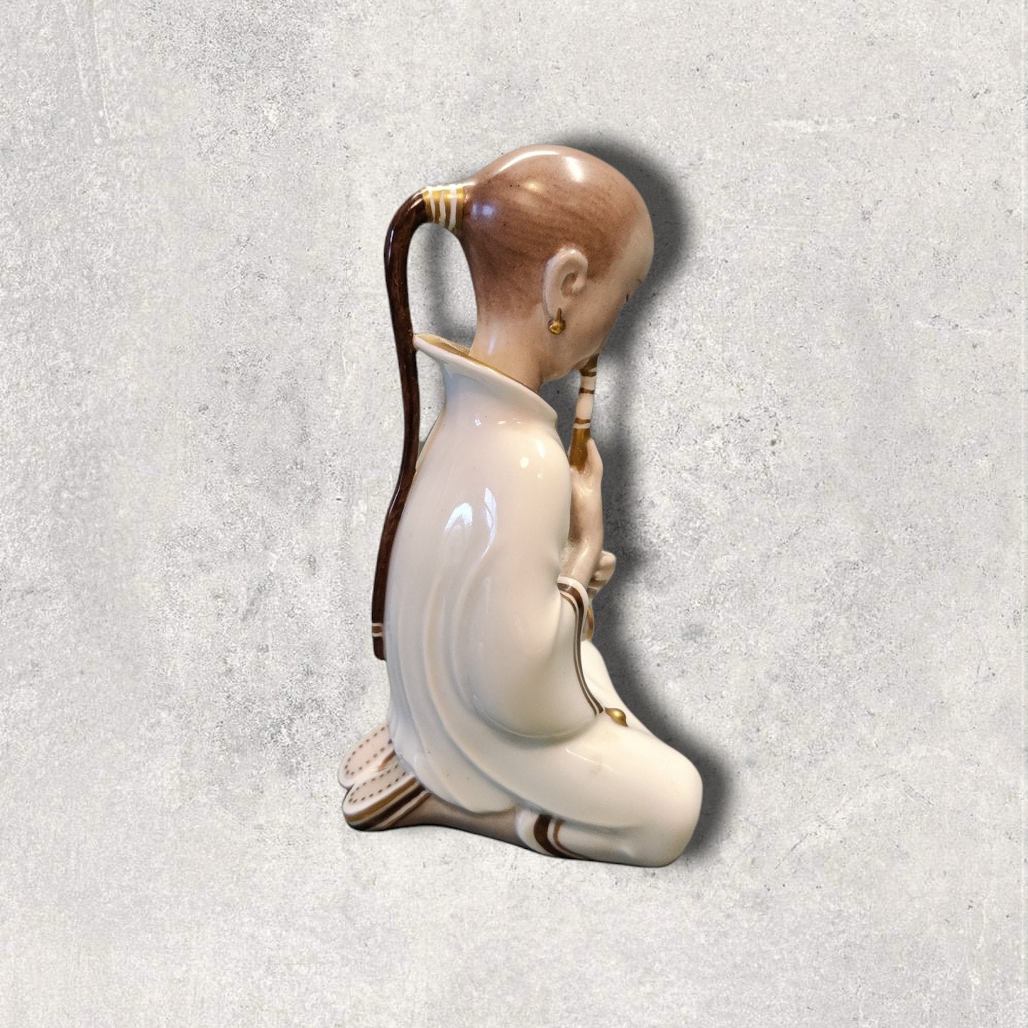 Royal Copenhagen no. 2342 Opium Smoking Girl. Overglazed Arno Malinowski